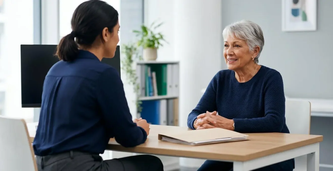 Doctor and senior patient having a collaborative discussion in a bright consultation room