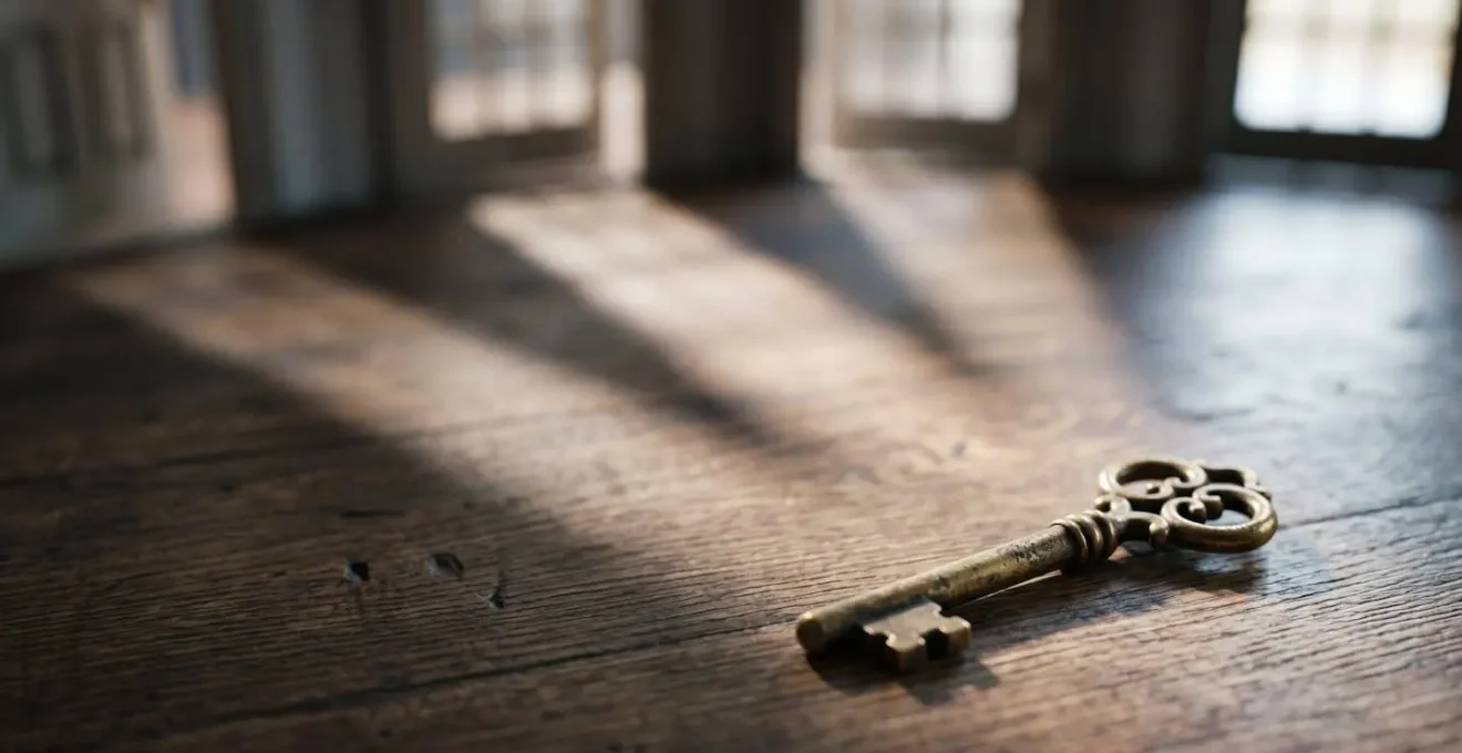 Conceptual image showing a single brass key on a table, symbolising pathways to multiple financial benefits