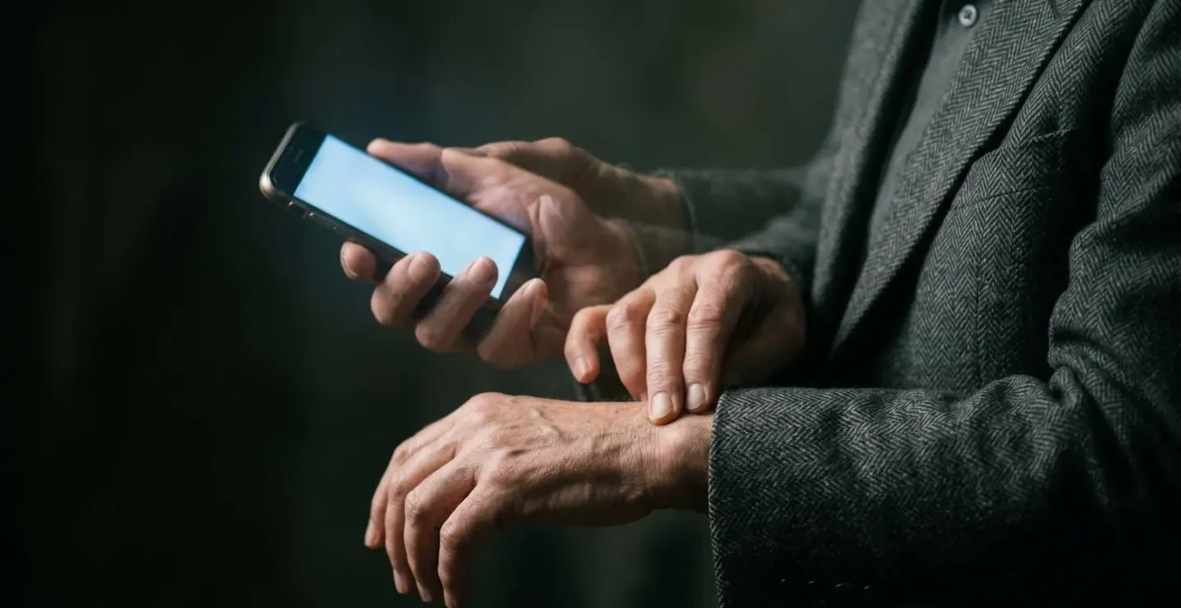 Atmospheric scene of hands repeatedly checking health metrics creating visual metaphor for digital health anxiety